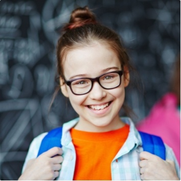 Child smiling after visiting the children's dentist