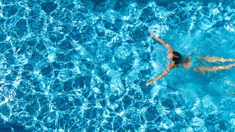 Woman swimming in pool